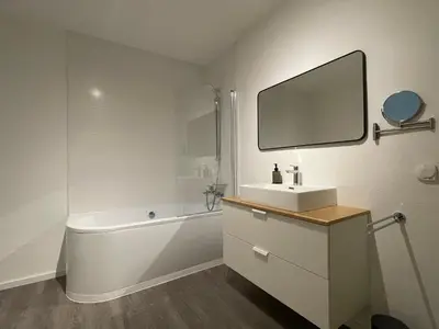 Ein Badezimmer in der Unterkunft Grand Suite - Perfekt für 6! BBQ WLAN Parken Messe