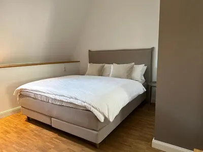 Ein Bett oder Betten in einem Zimmer der Unterkunft Großes Apartment für Business, Family & Friends