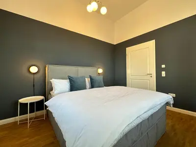 Ein Bett oder Betten in einem Zimmer der Unterkunft Großes Apartment für Business, Family & Friends