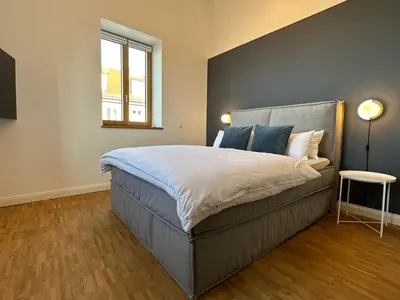 Ein Bett oder Betten in einem Zimmer der Unterkunft Großes Apartment für Business, Family & Friends