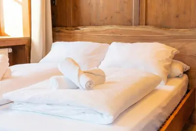 Ein Bett oder Betten in einem Zimmer der Unterkunft Neu! Moderner bayrischer Flair vor Pilatushaus