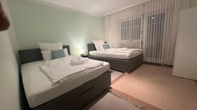 Ein Bett oder Betten in einem Zimmer der Unterkunft Oase1 mit Parkplatz, Automatische Kaffeemaschine und Küche