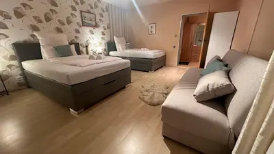 Ein Bett oder Betten in einem Zimmer der Unterkunft Oase1 mit Parkplatz, Automatische Kaffeemaschine und Küche