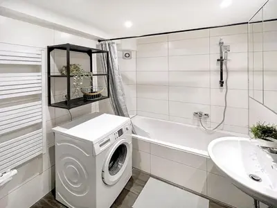 Ein Badezimmer in der Unterkunft Gemütliche Oase in der Innenstadt, zwei Minuten zum Rathaus