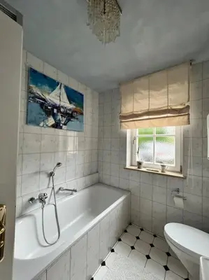 Ein Badezimmer in der Unterkunft Chiemsee-Hafen_Gemütliche Wohnung am Chiemsee