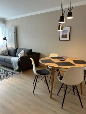Ein Sitzbereich in der Unterkunft Chiemgau Comfort F4 Ferienwohnanlage Oberaudorf mit Hallenbad und Sauna
