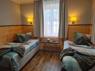 Ein Bett oder Betten in einem Zimmer der Unterkunft Ferienwohnung Rose - b47219