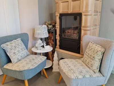 Ein Sitzbereich in der Unterkunft Ferienwohnung Rose - b47219