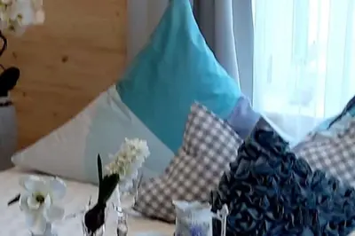 Ein Bett oder Betten in einem Zimmer der Unterkunft Ferienwohnung Rose - b47219