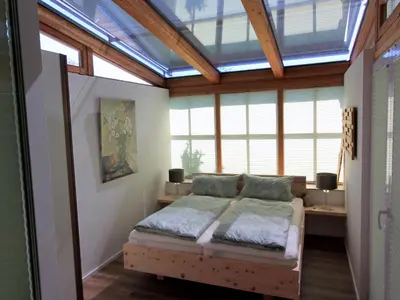 Ein Bett oder Betten in einem Zimmer der Unterkunft Ferienwohnung Zirbentraum