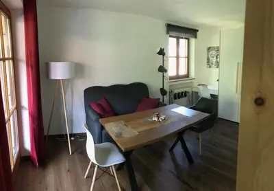 Ein Sitzbereich in der Unterkunft Apartment Kofel