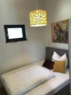 Ein Bett oder Betten in einem Zimmer der Unterkunft Schöne 1,5 Zimmer Wohnung mit Aussenterrasse, Nice small 1,5 room flat with an outside terrace