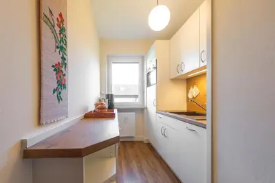 Küche/Küchenzeile in der Unterkunft Chiemgau Comfort C6 Ferienwohnanlage Oberaudorf mit Hallenbad und Sauna