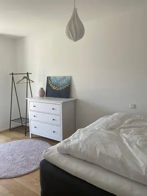 Ein Bett oder Betten in einem Zimmer der Unterkunft Wunderschönes 4 Zimmer Apartment mit Seeblick