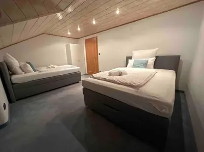 Ein Bett oder Betten in einem Zimmer der Unterkunft Apartment Oase 2, Parkplatz, Küche, Internet