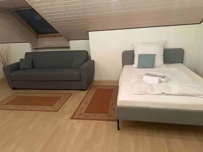 Ein Bett oder Betten in einem Zimmer der Unterkunft Apartment Oase 2, Parkplatz, Küche, Internet