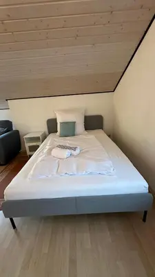 Ein Bett oder Betten in einem Zimmer der Unterkunft Apartment Oase 2, Parkplatz, Küche, Internet