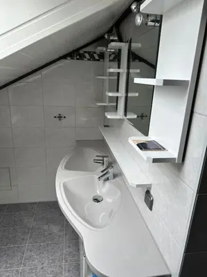 Ein Badezimmer in der Unterkunft Apartment Oase 2, Parkplatz, Küche, Internet