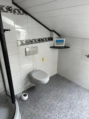 Ein Badezimmer in der Unterkunft Apartment Oase 2, Parkplatz, Küche, Internet
