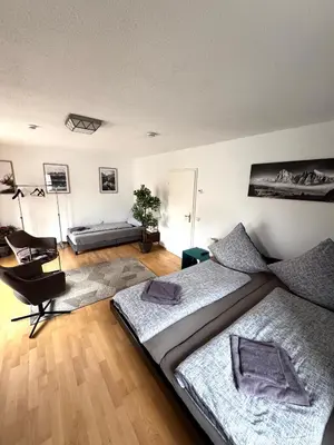 Ein Sitzbereich in der Unterkunft Ferienhaus Weilheim mit Garten Spiel und Spass