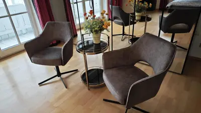 Ein Sitzbereich in der Unterkunft Ferienhaus Weilheim mit Garten Spiel und Spass