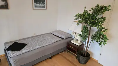 Ein Bett oder Betten in einem Zimmer der Unterkunft Ferienhaus Weilheim mit Garten Spiel und Spass