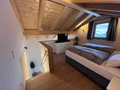 Ein Bett oder Betten in einem Zimmer der Unterkunft Ferienwohnung Osterbach