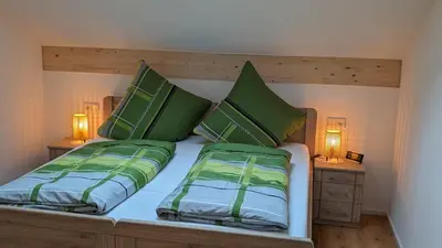 Ein Bett oder Betten in einem Zimmer der Unterkunft Tag-Hof
