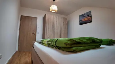Ein Bett oder Betten in einem Zimmer der Unterkunft Tag-Hof