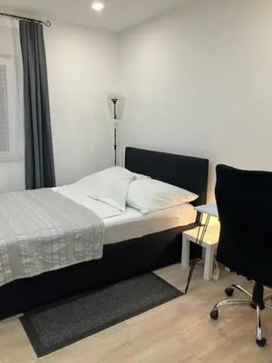 Ein Bett oder Betten in einem Zimmer der Unterkunft Moderne Einliegerwohnung nähe Ingolstadt und Bad Gögging