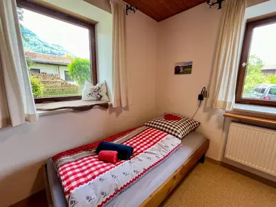 Ein Bett oder Betten in einem Zimmer der Unterkunft Almglück