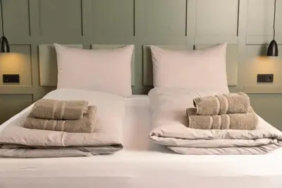 Ein Bett oder Betten in einem Zimmer der Unterkunft STORK's NEST