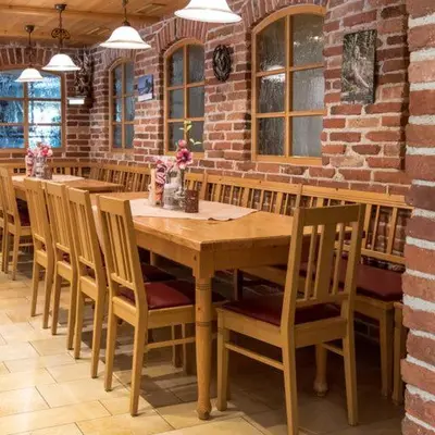 Ein Restaurant oder anderes Speiselokal in der Unterkunft Gasthaus Paulus