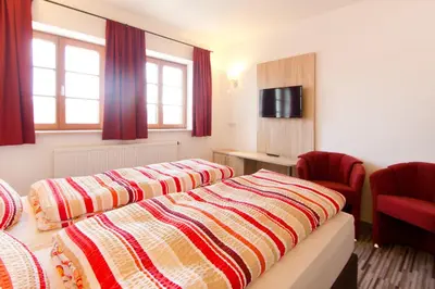 Ein Bett oder Betten in einem Zimmer der Unterkunft Gasthaus Paulus