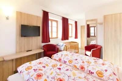 Ein Bett oder Betten in einem Zimmer der Unterkunft Gasthaus Paulus