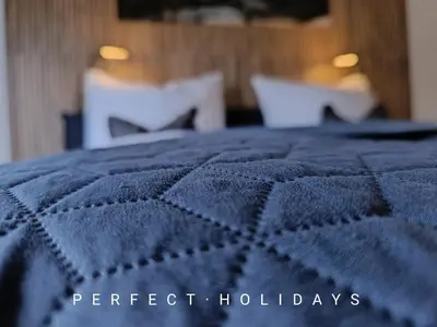 Ein Bett oder Betten in einem Zimmer der Unterkunft Ferienwohnung Ott