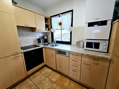 Küche/Küchenzeile in der Unterkunft Lechbruck am See Feriendorf Hochbergle Haus 111