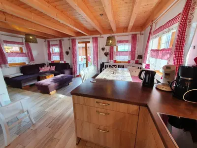 Ein Sitzbereich in der Unterkunft Lechbruck am See Feriendorf Via Claudia Haus 65 Casa Bavaria