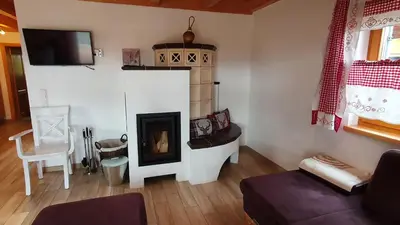 Ein Sitzbereich in der Unterkunft Lechbruck am See Feriendorf Via Claudia Haus 65 Casa Bavaria