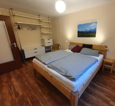 Ein Bett oder Betten in einem Zimmer der Unterkunft Lechbruck am See Zentral nahe Bootshafen Apartment Wellmann