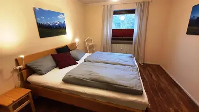Ein Bett oder Betten in einem Zimmer der Unterkunft Lechbruck am See Zentral nahe Bootshafen Apartment Wellmann
