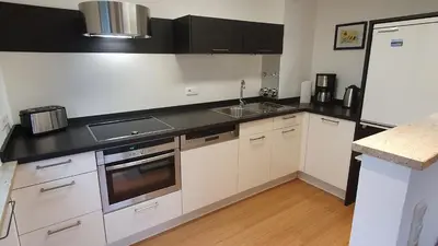 Küche/Küchenzeile in der Unterkunft Lechbruck am See Zentral nahe Bootshafen Apartment Wellmann