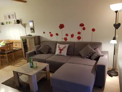Ein Sitzbereich in der Unterkunft Lechbruck am See Feriendorf Hochbergle Haus 99