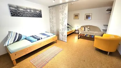 Ein Sitzbereich in der Unterkunft Bei München Ferienwohnung in Grafrath 