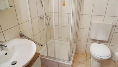 Ein Badezimmer in der Unterkunft Lechbruck am See Feriendorf Hochbergle Haus 140