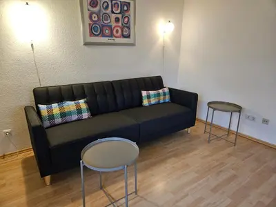 Ein Sitzbereich in der Unterkunft Bei München Ferienwohnung in Grafrath 
