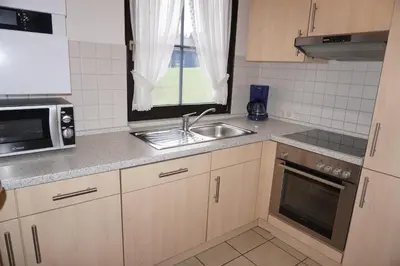 Küche/Küchenzeile in der Unterkunft Lechbruck am See Feriendorf Hochbergle Haus 1