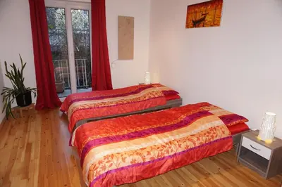 Ein Bett oder Betten in einem Zimmer der Unterkunft Bei München Ferienwohnung in Dachau 