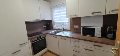 Küche/Küchenzeile in der Unterkunft Lechbruck am See Feriendorf Hochbergle Haus 131