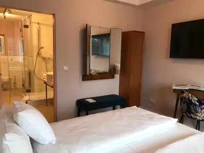 Ein Bett oder Betten in einem Zimmer der Unterkunft Lèvres Hotel